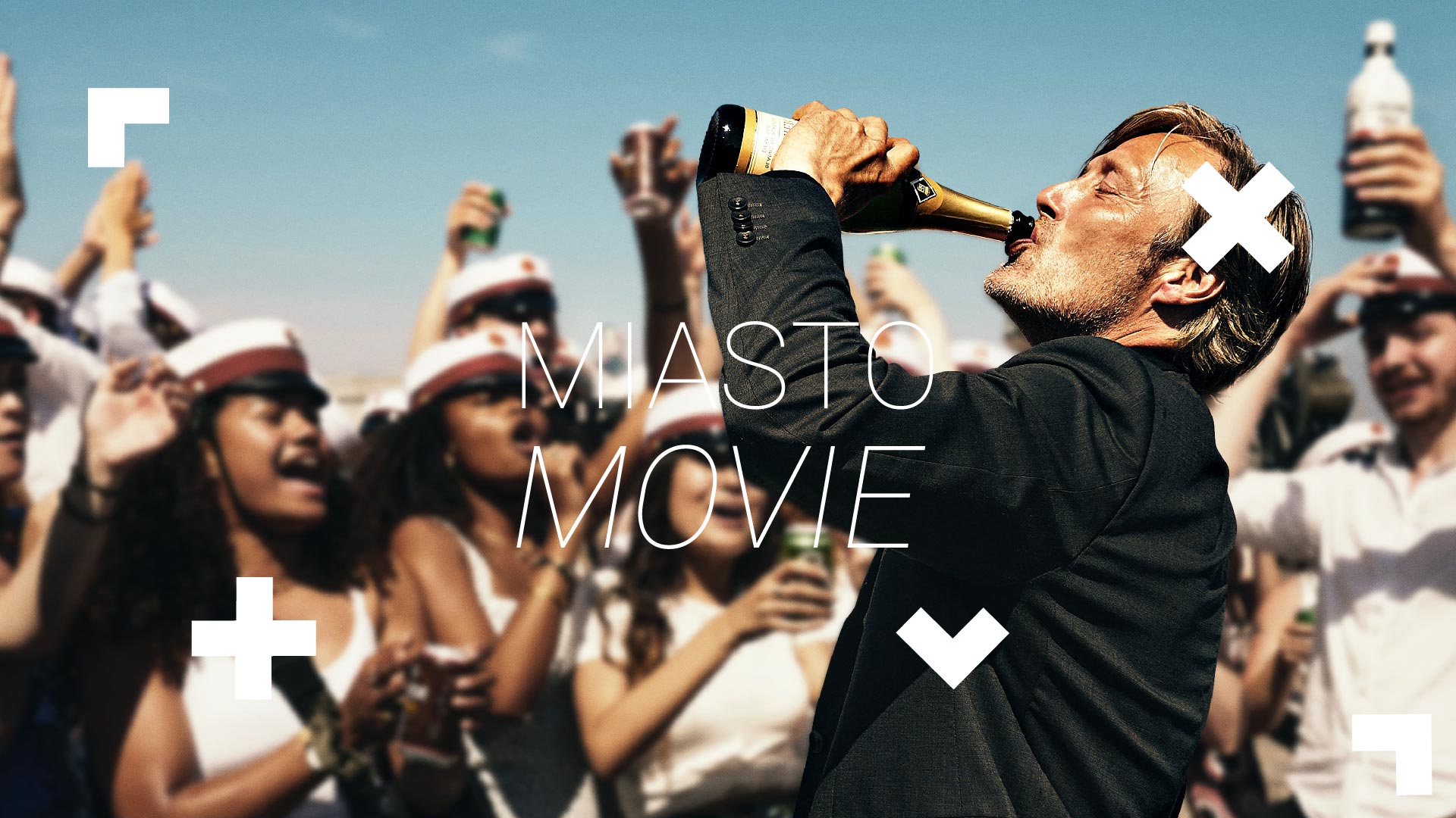 A shot from the film. The protagonist is drinking from the bottle in a crowd of people.