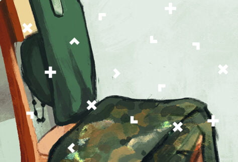 Obrazek z krzesłem, na którym leży umundurowanie.