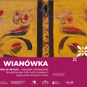 Na drewnianej skrzyni są namalowane kwiaty. napis: Wianówka.